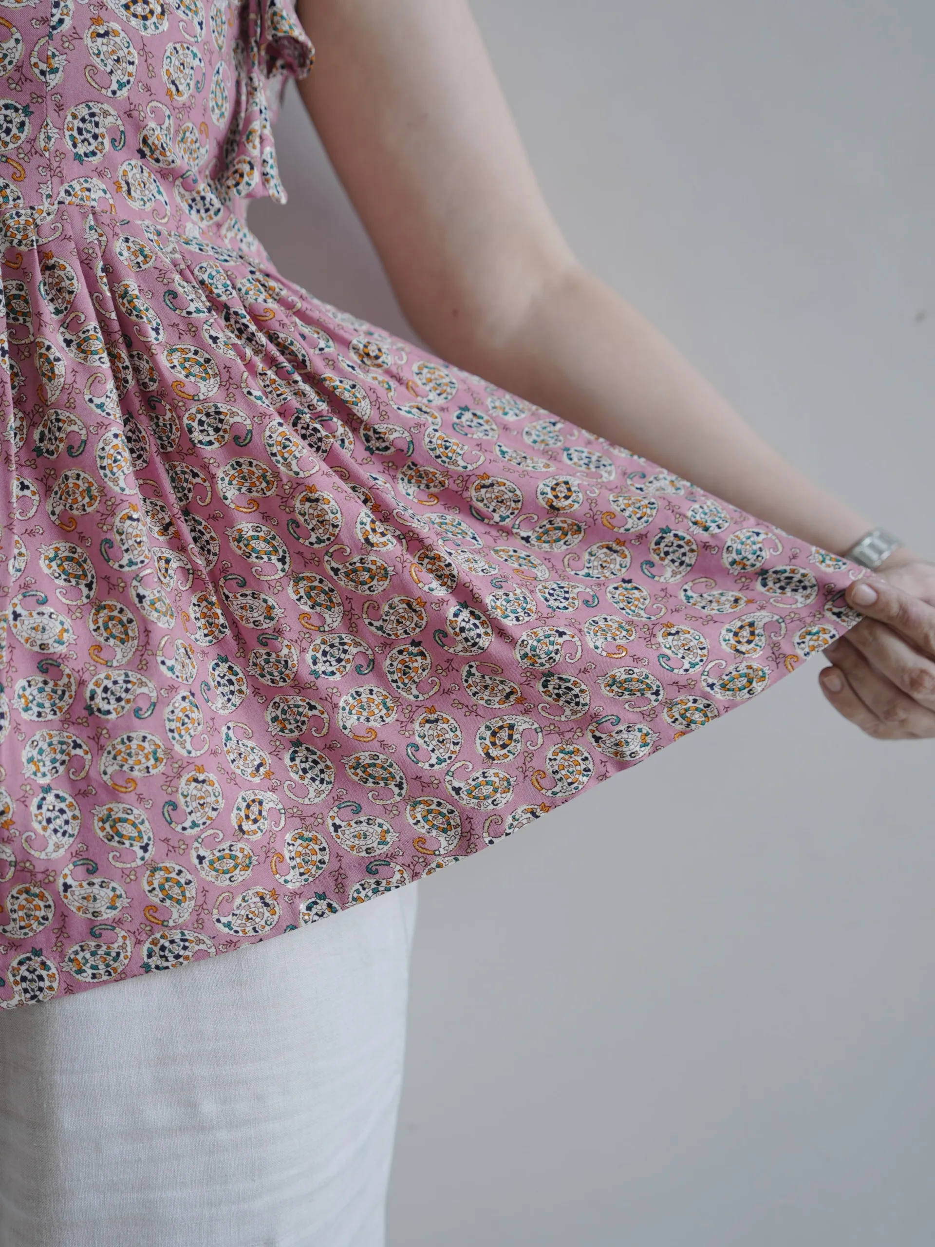 ZVE06964-min Floral Peplum Pink Top - Image 2